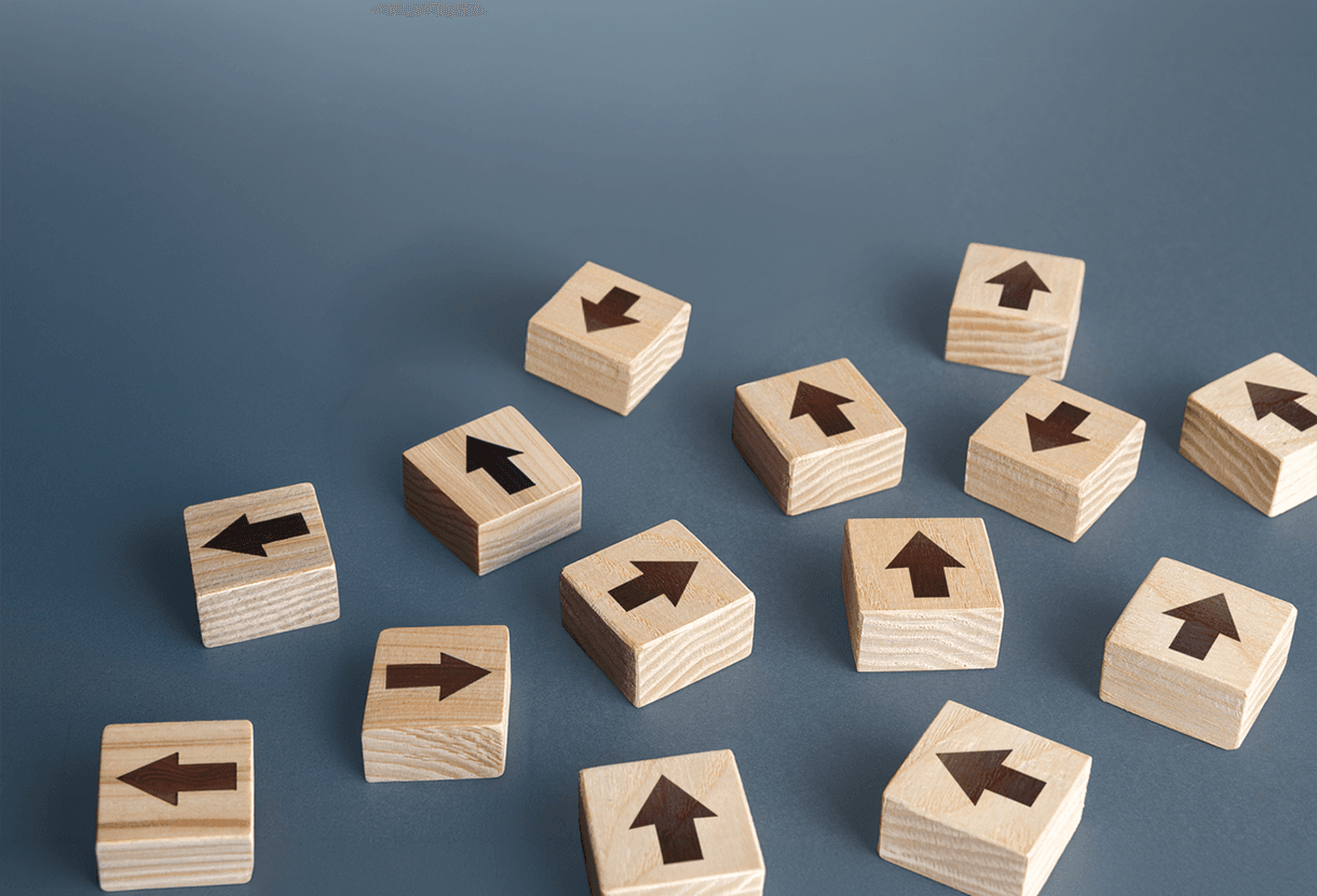 image: wooden blocks with arrows facing in every direction (iStockphoto)