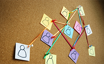 photo: paper icons of people connecting with string (iStockphoto)