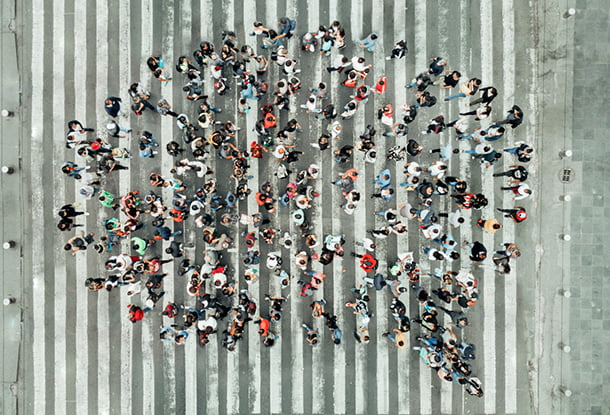 photo: speech bubble made of people photographed from above (iStockphoto)
