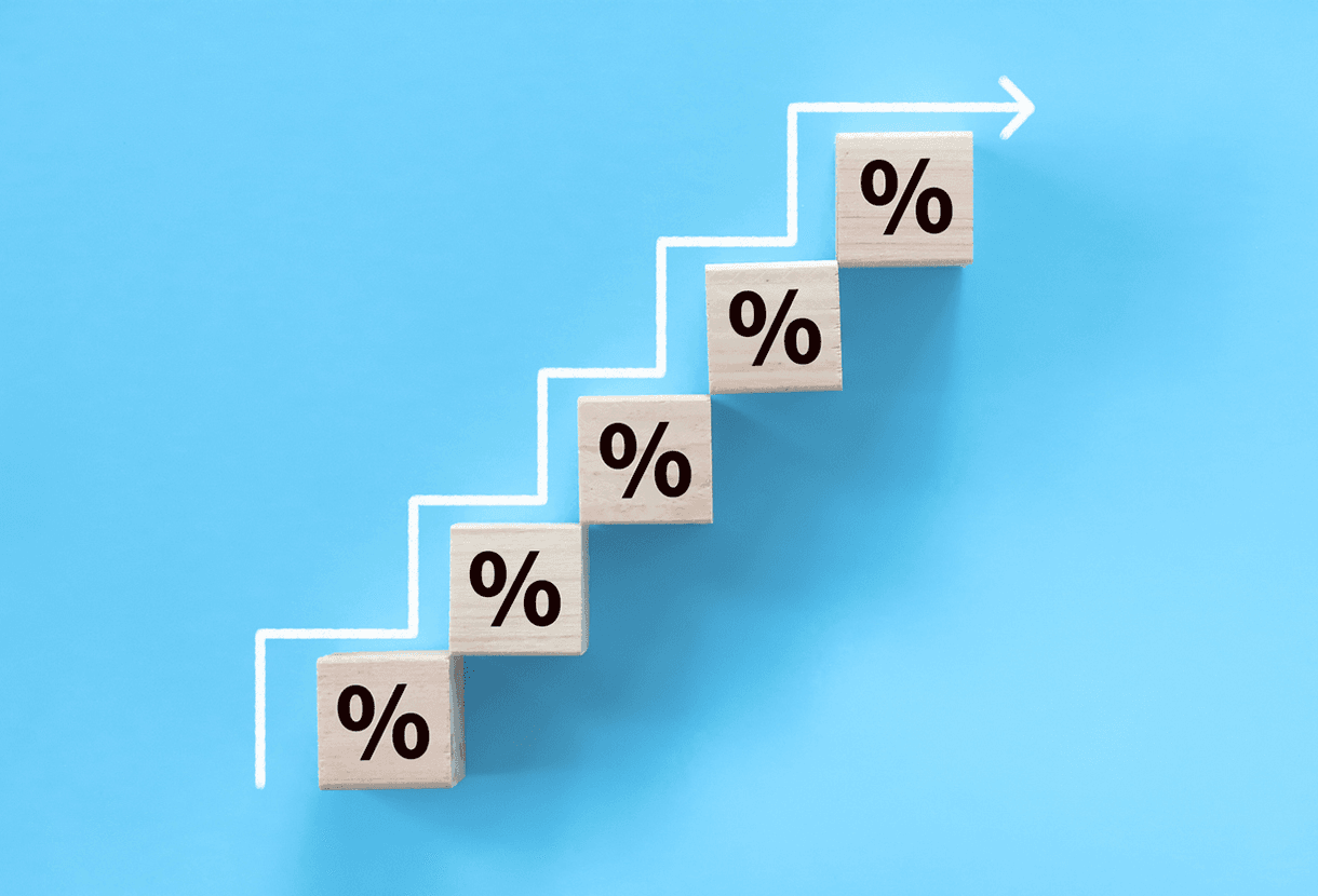 Image: blocks with percentage signs moving in a staircase pattern upwards (iStockphoto)
