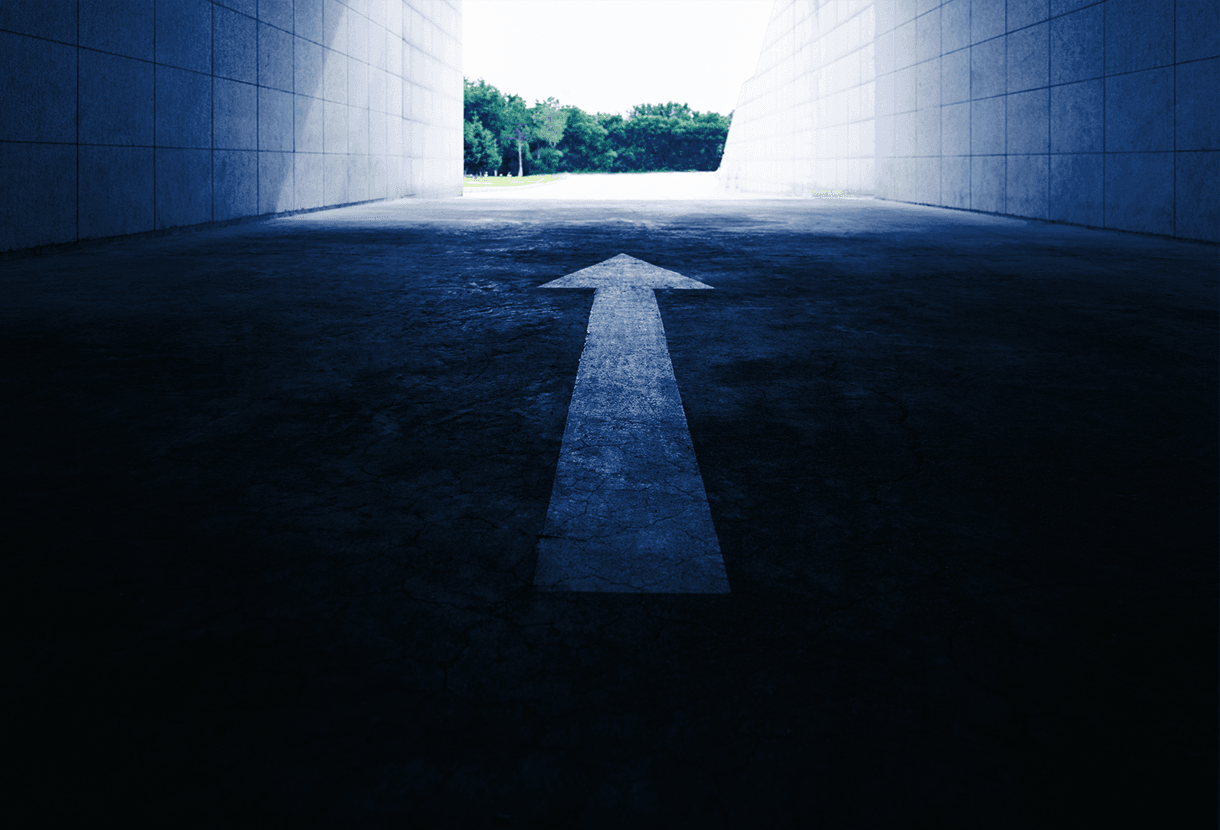 image: tunnel with arrow pointing the way out (iStockphoto)